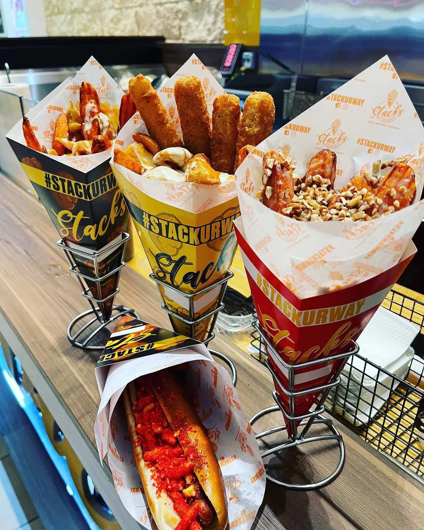 Three paper cones of Potato Stacks from a McAllen clubs
