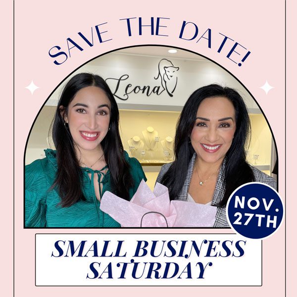 Two black-haired women smile for the camera at a mcallen clothing stores.