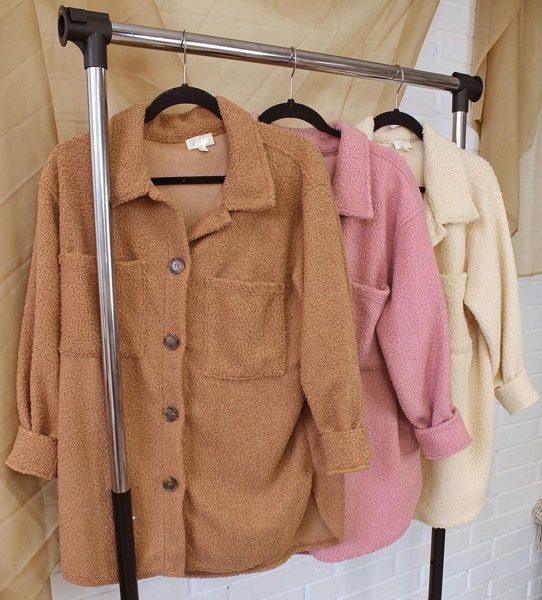 Rack of brown and pink jackets at 17th street mcallen stores.