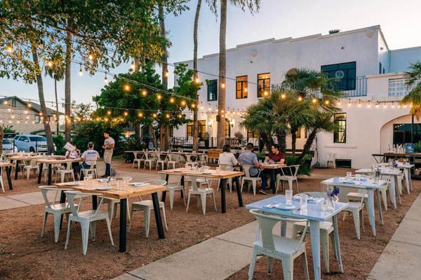 Pristine outdoor patio of a White Restaurant near the 17th street McAllen clubs.