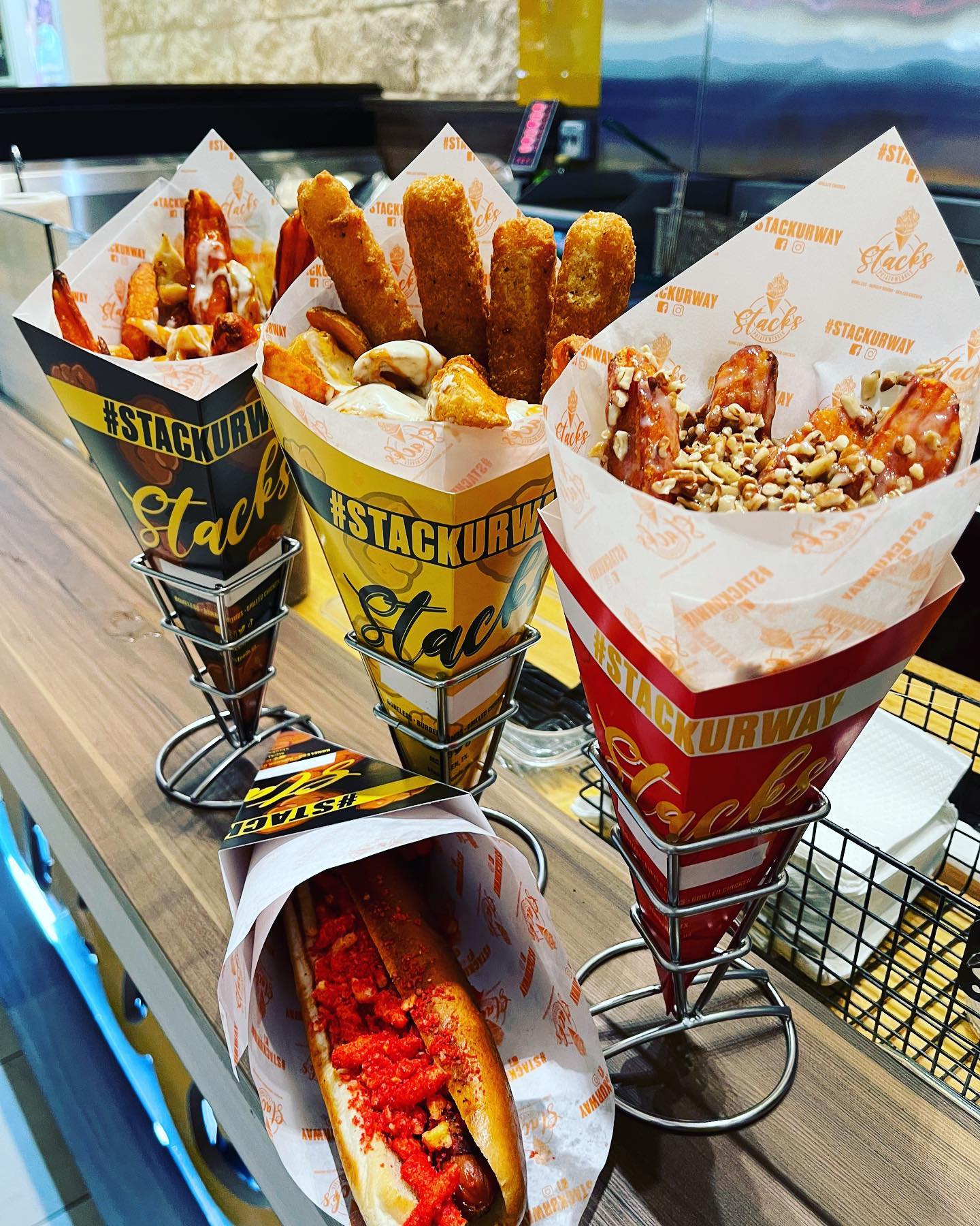 Three paper cones of Potato Stacks from a McAllen clubs