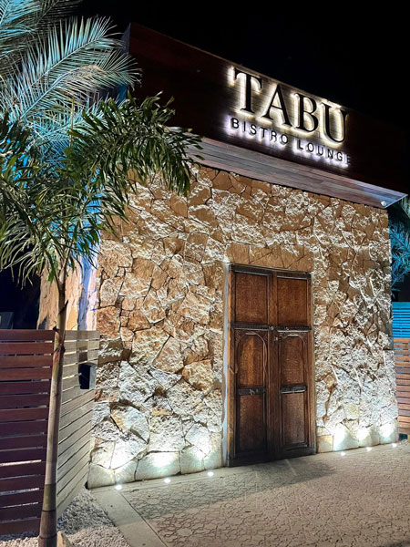 Tabu Restaurant exterior at night on downtown McAllen, tx