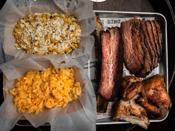 A full plate of brisket, mac and cheese, and corn showed from above in one of the restaurants in McAllen.
